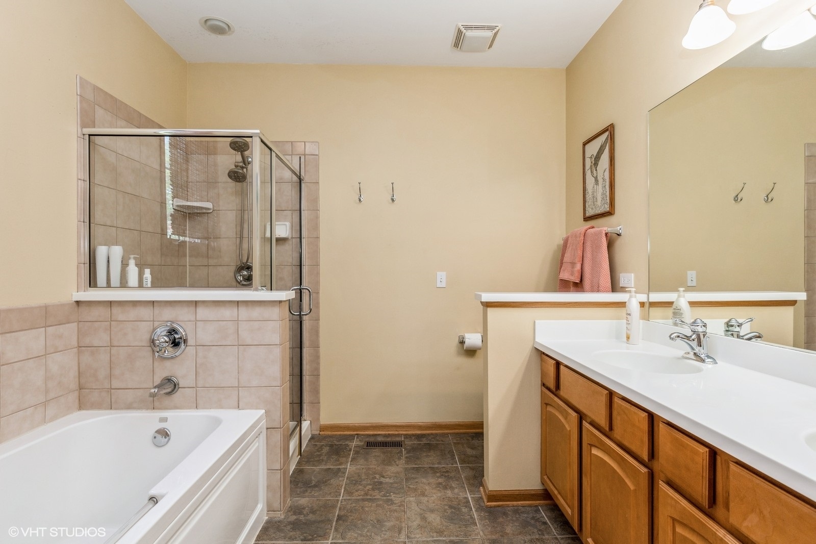 162 Dawson Drive Elgin, IL 60120 - Photo 9 of 15 a bathroom with a tub sink and mirror