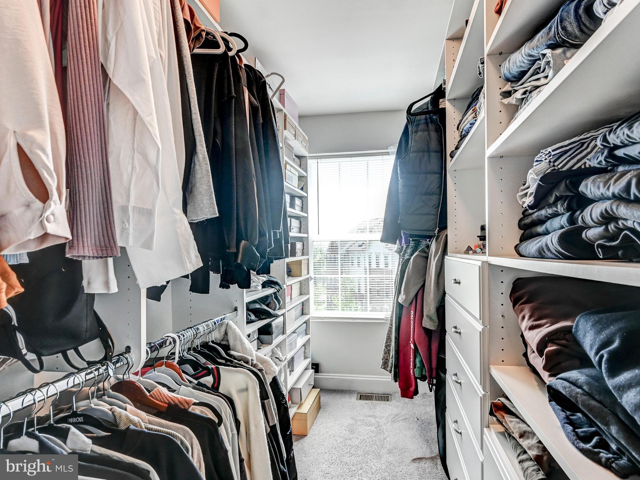 5000 John Buck Avenue Perry Hall, MD 21128 - Photo 29 of 41 a view of walk in closet with clothes and shoes