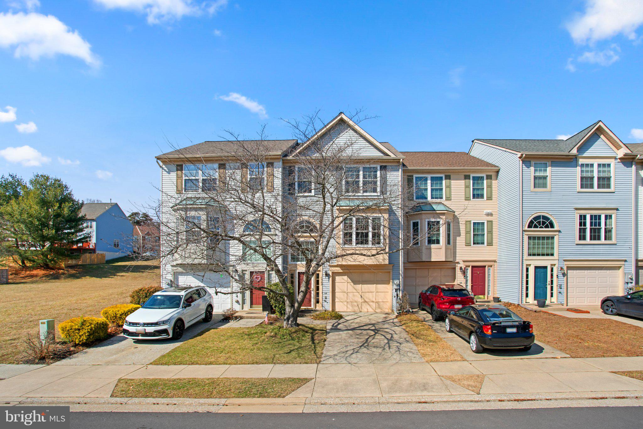 6342 Arbor Way Elkridge, MD 21075 - Photo 1 of 38 a front view of a house with a yard