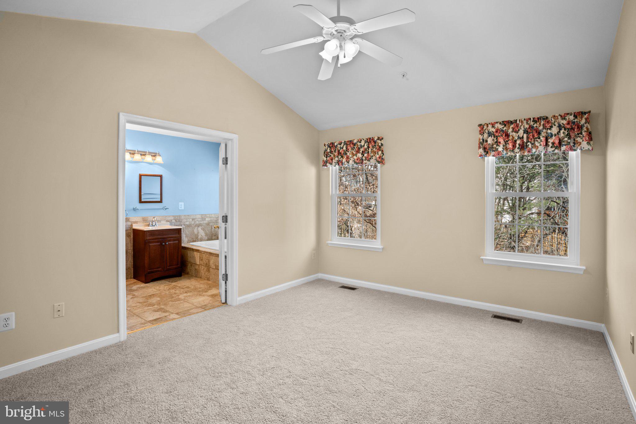 6342 Arbor Way Elkridge, MD 21075 - Photo 13 of 38 a view of a livingroom with a ceiling fan and window