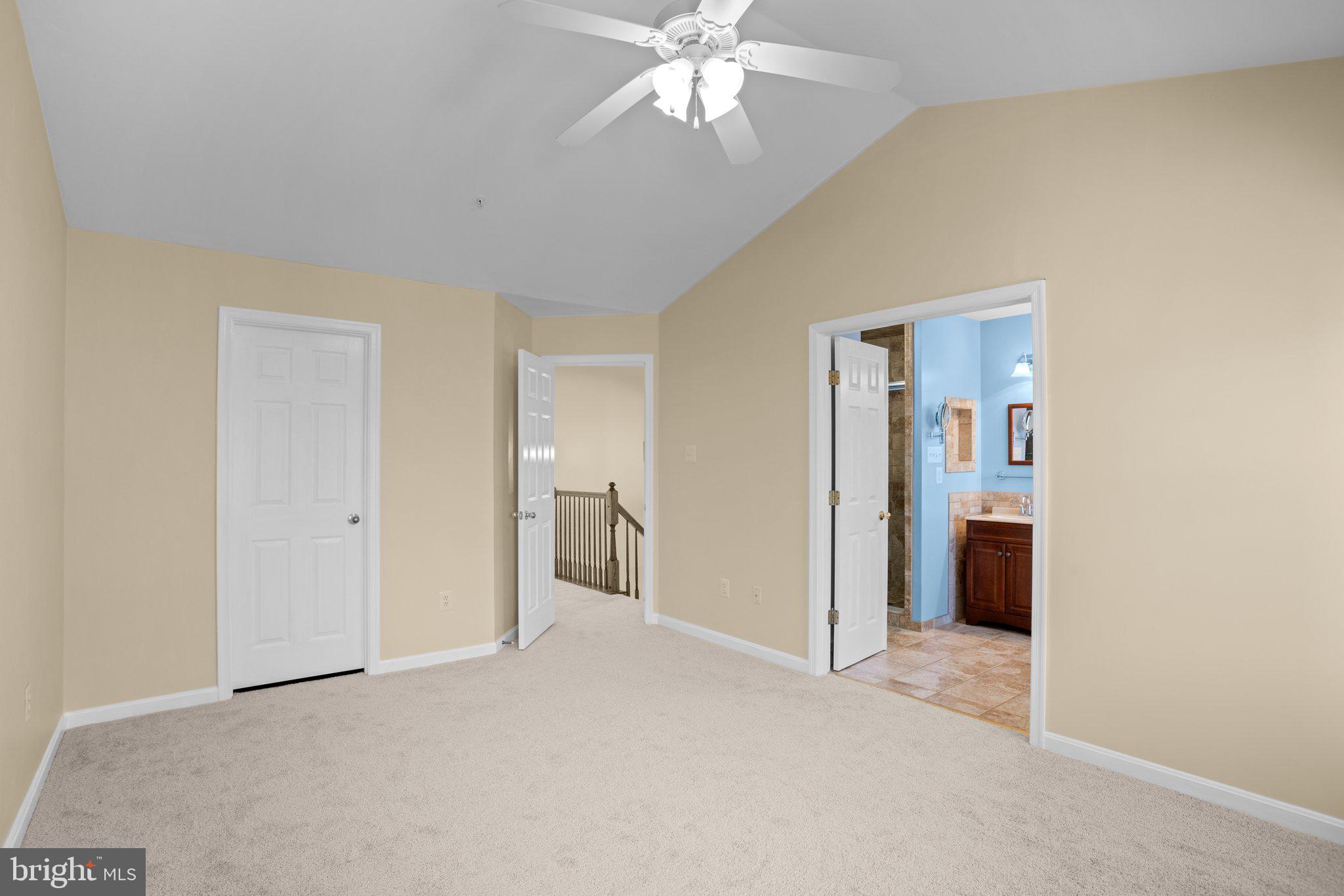 6342 Arbor Way Elkridge, MD 21075 - Photo 14 of 38 a view of a room with a ceiling fan and bathroom