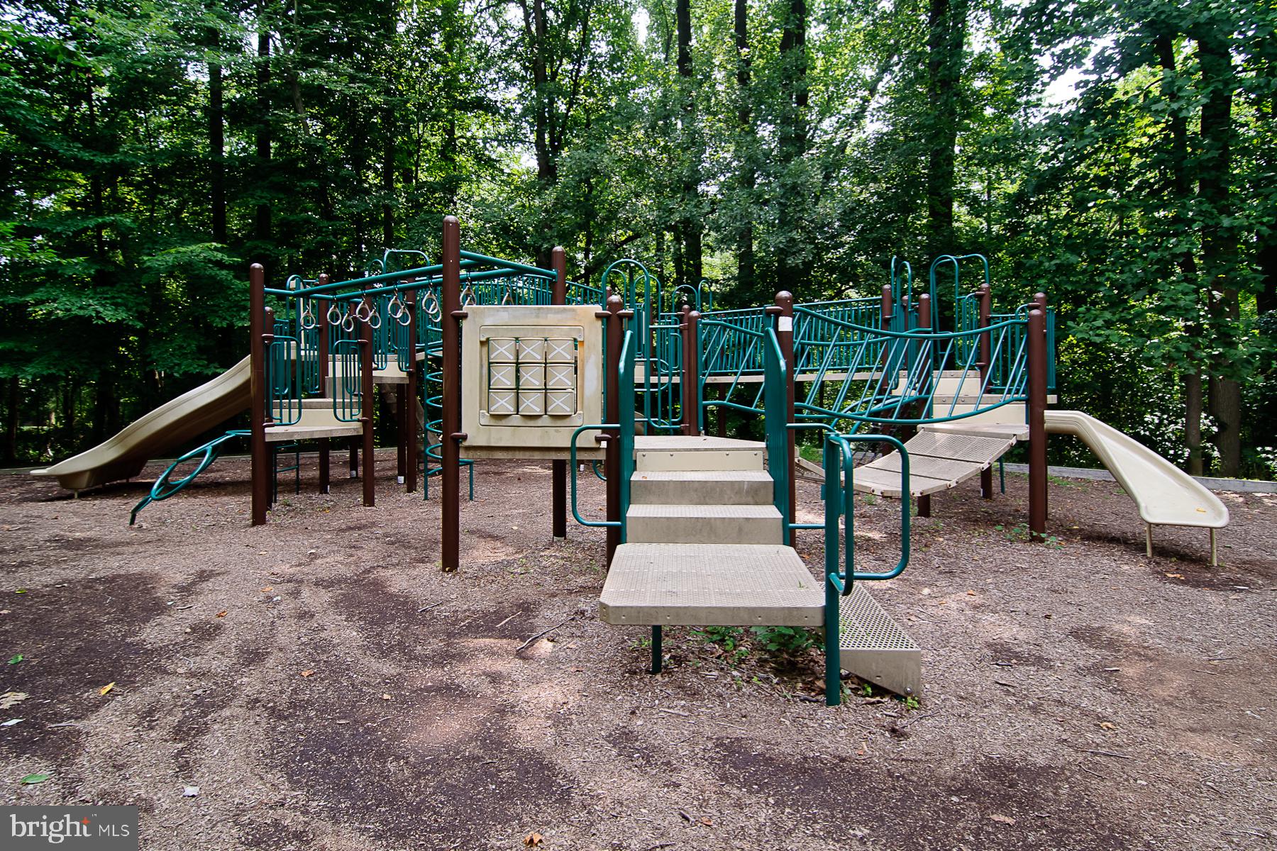 6342 Arbor Way Elkridge, MD 21075 - Photo 31 of 38 a view of a bench in a garden
