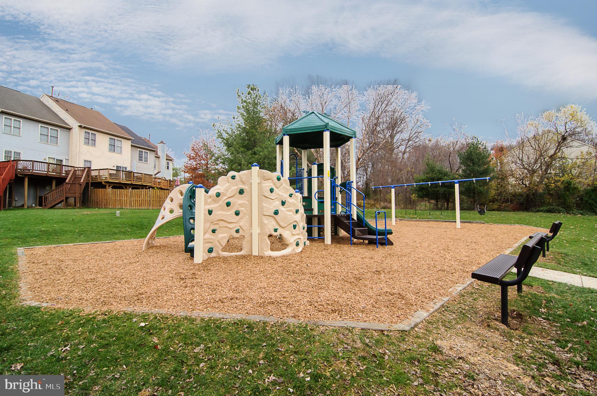 6342 Arbor Way Elkridge, MD 21075 - Photo 33 of 38 a view of a house with backyard and a slide