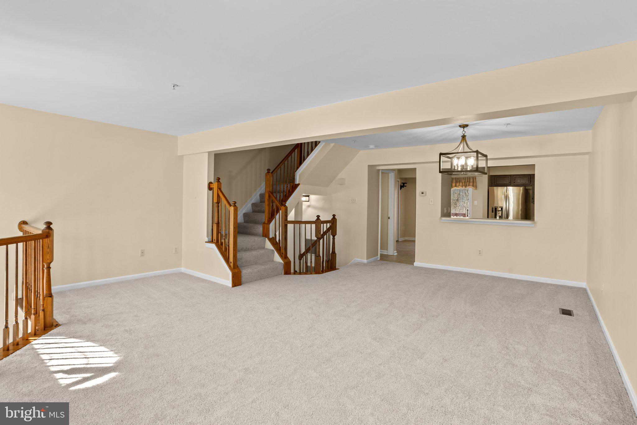 6342 Arbor Way Elkridge, MD 21075 - Photo 4 of 38 a view of an empty room with a window