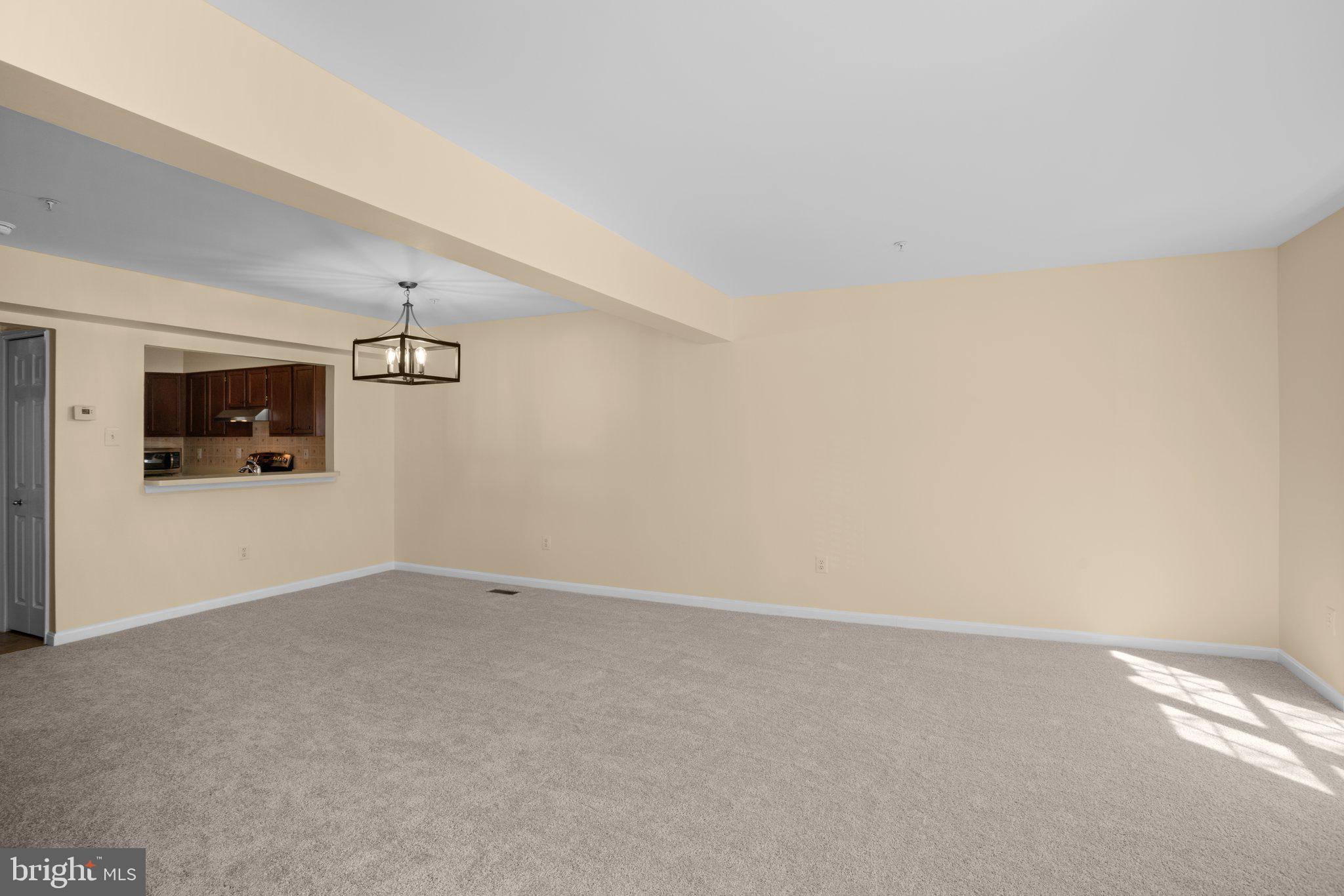 6342 Arbor Way Elkridge, MD 21075 - Photo 6 of 38 a view of a room with rack on the wall