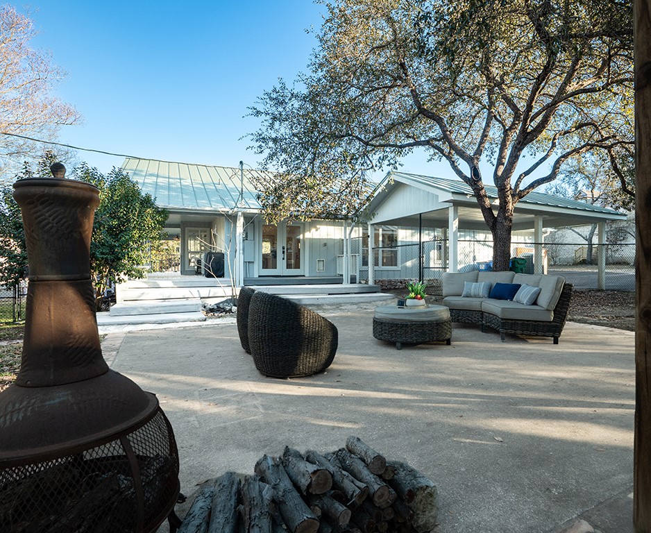 5108 Sioux Lane Austin, TX 78734 - Photo 34 of 35 a view of a patio with couches table and chairs and potted plants