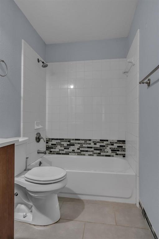 3920 Cane River Road Fort Worth, TX 76244 - Photo 11 of 22 a bathroom with a toilet and a shower