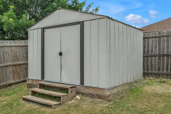 a house view with a garden space