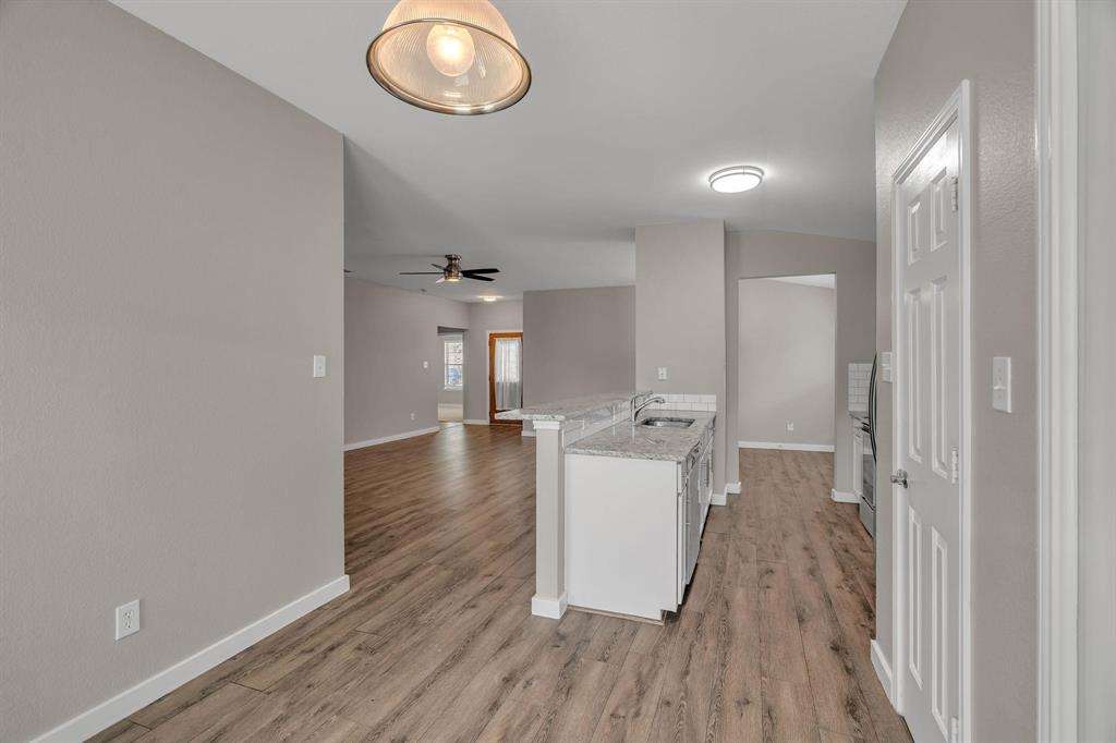 3920 Cane River Road Fort Worth, TX 76244 - Photo 5 of 22 a view of a house and wooden floor