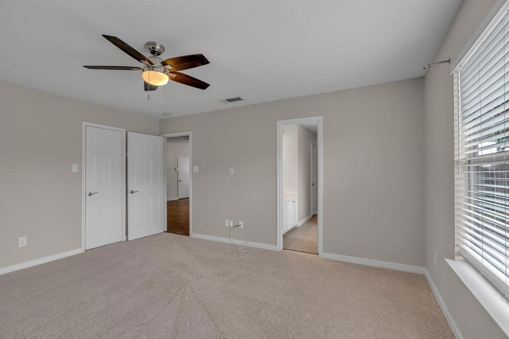 3920 Cane River Road Fort Worth, TX 76244 - Photo 7 of 22 a view of an empty room with a window