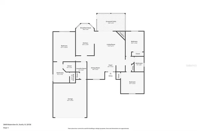 a front view of a house with a yard garage and outdoor seating