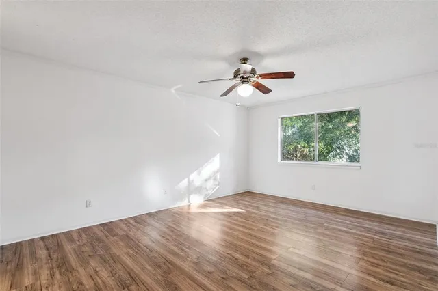 a bathroom with a bathtub a sink and mirror