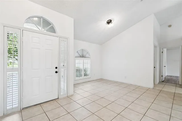 a view of an empty room and window