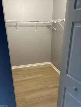 a view of a room with racks on the wall