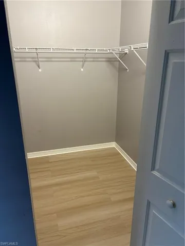 a view of a room with racks on the wall