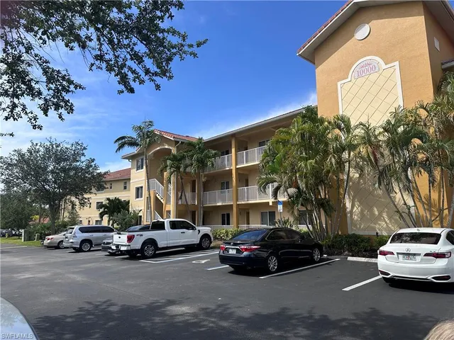 a car parked in front of a house
