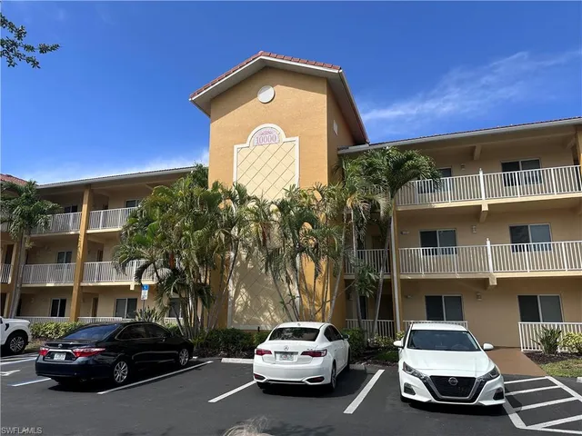 a car parked in front of a building