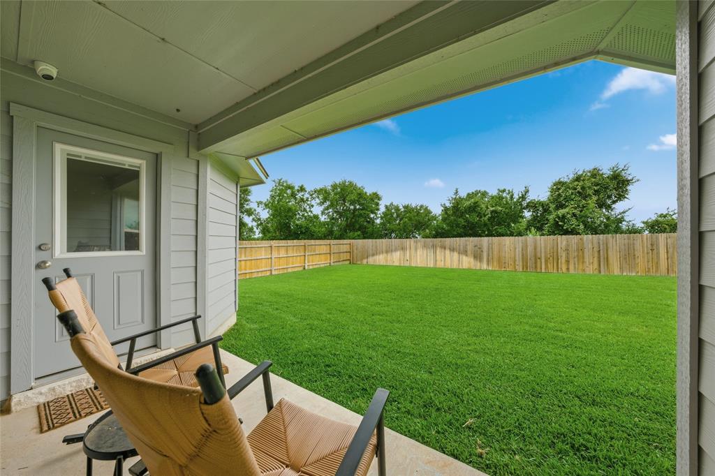 10712 Peperak Court Waco, TX 76708 - Photo 23 of 25 a view of yard with seating area