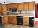 41316 Red Hill Road Leesburg, VA 20175 - Photo 11 of 36 a kitchen with a sink and a cabinets