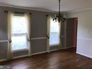 41316 Red Hill Road Leesburg, VA 20175 - Photo 15 of 36 an empty room with wooden floor and windows