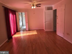 41316 Red Hill Road Leesburg, VA 20175 - Photo 34 of 36 a view of a room with wooden floor and fan