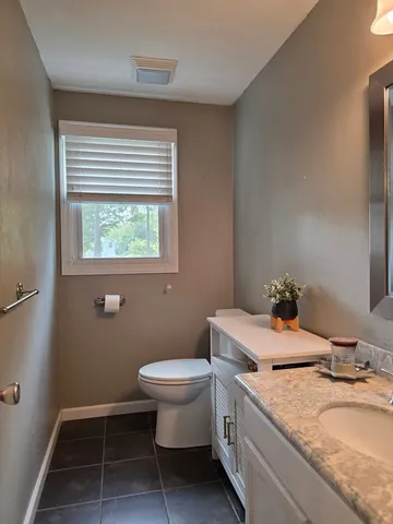a kitchen with stainless steel appliances a sink stove and cabinets