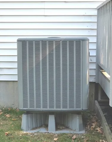 a view of a house with a fence