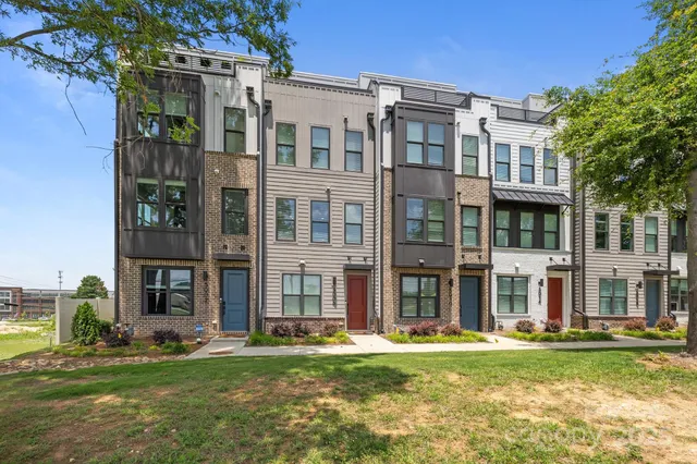 front view of a building with a yard