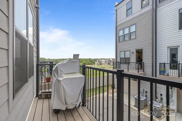 a view of a balcony with a patio