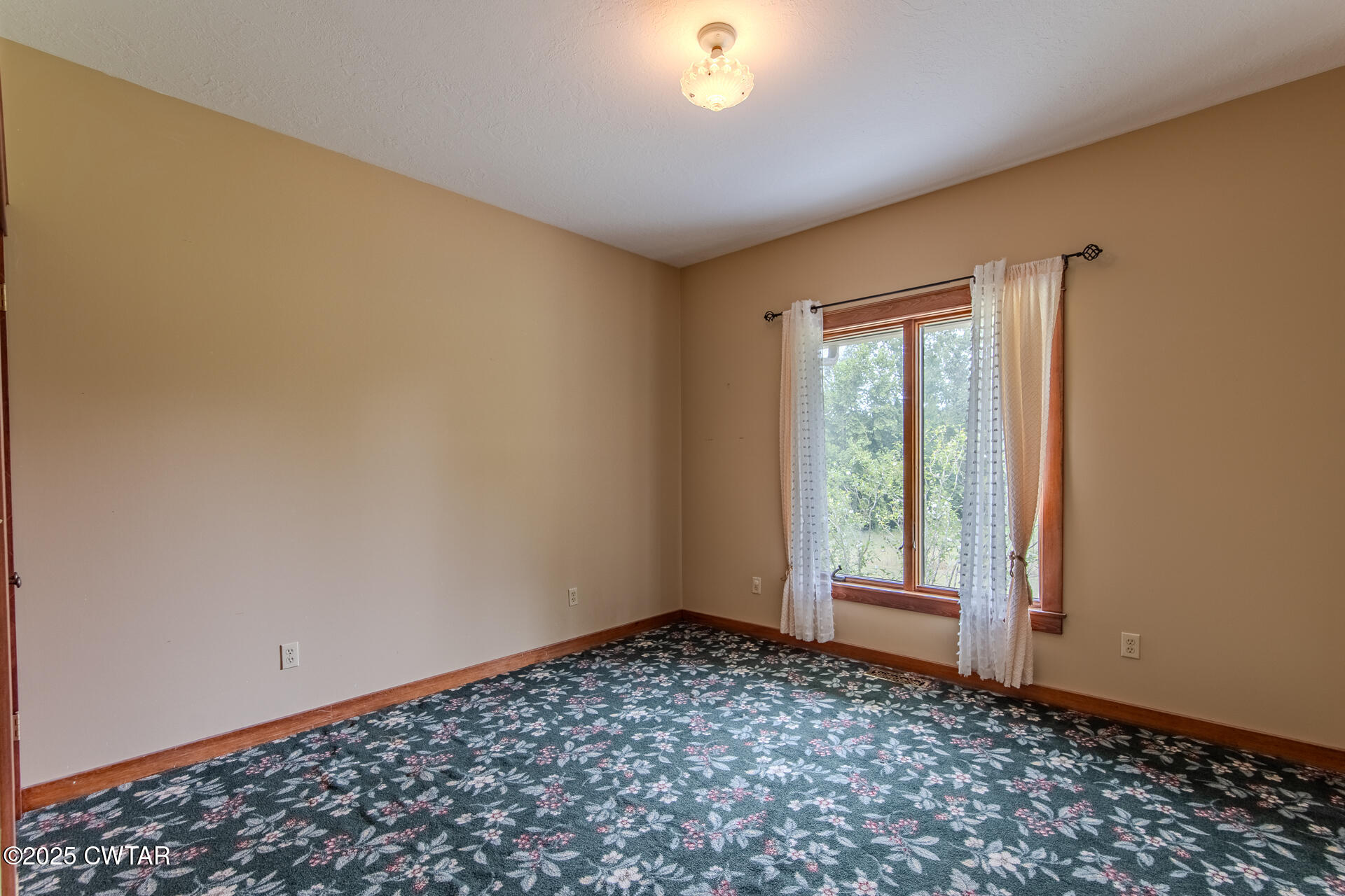 3554 Shades Bridge Road Greenfield, TN 38230 - Photo 33 of 49 a view of an empty room and window