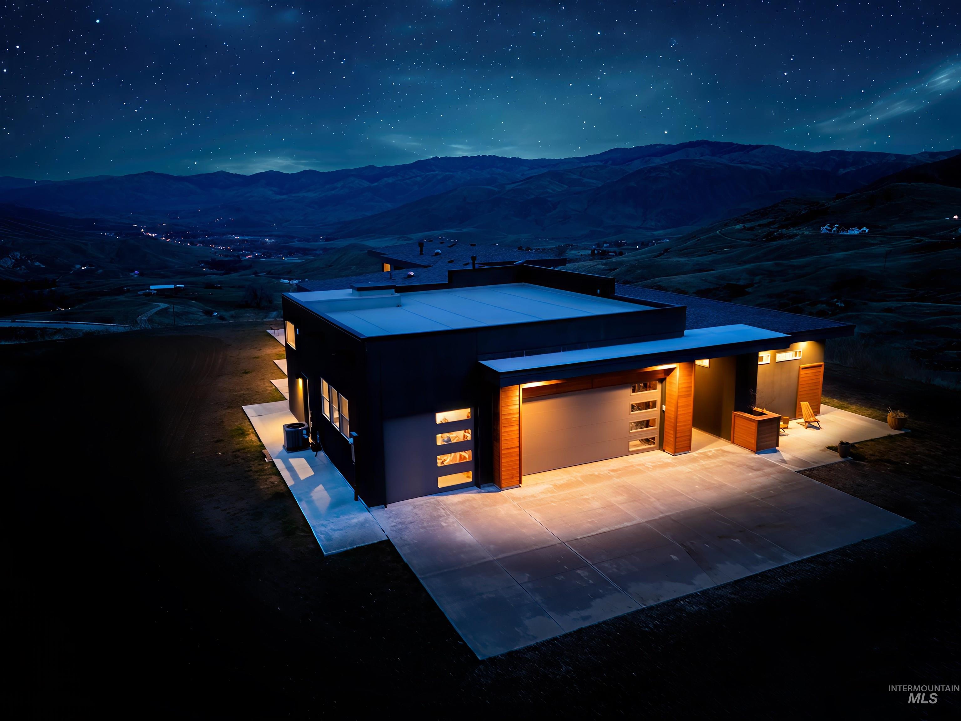 170 Summit Ridge Road Horseshoe Bend, ID 83629 - Photo 47 of 50 Contemporary house with driveway and a mountain view