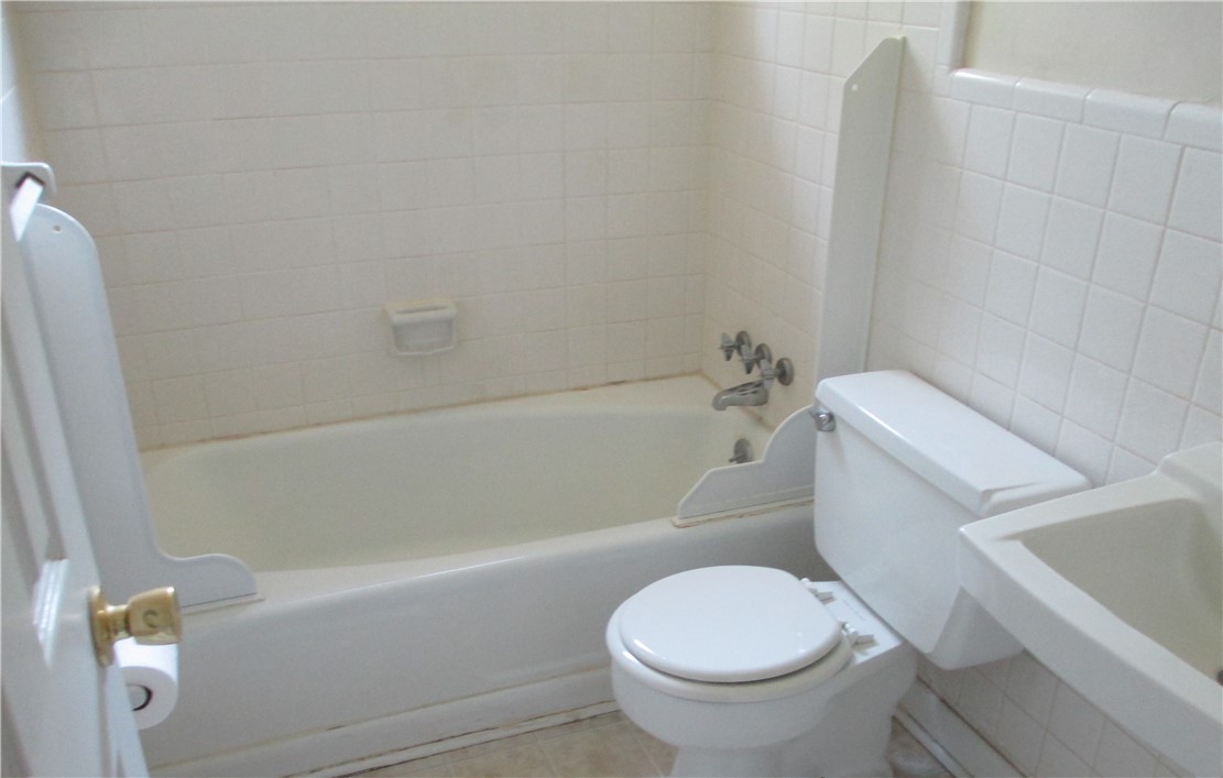 216 Lacustrian Lane, Unit 25 Central, SC 29630 - Photo 2 of 8 This bathroom features classic tile work and essential fixtures for comfortable living.