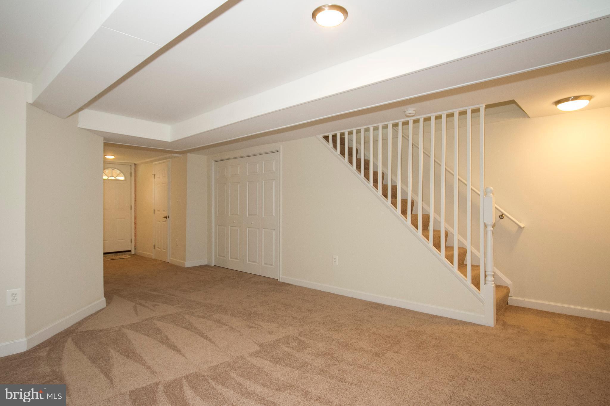 1381 Deanwood Road Baltimore, MD 21234 - Photo 12 of 27 a view of an empty room with stairs