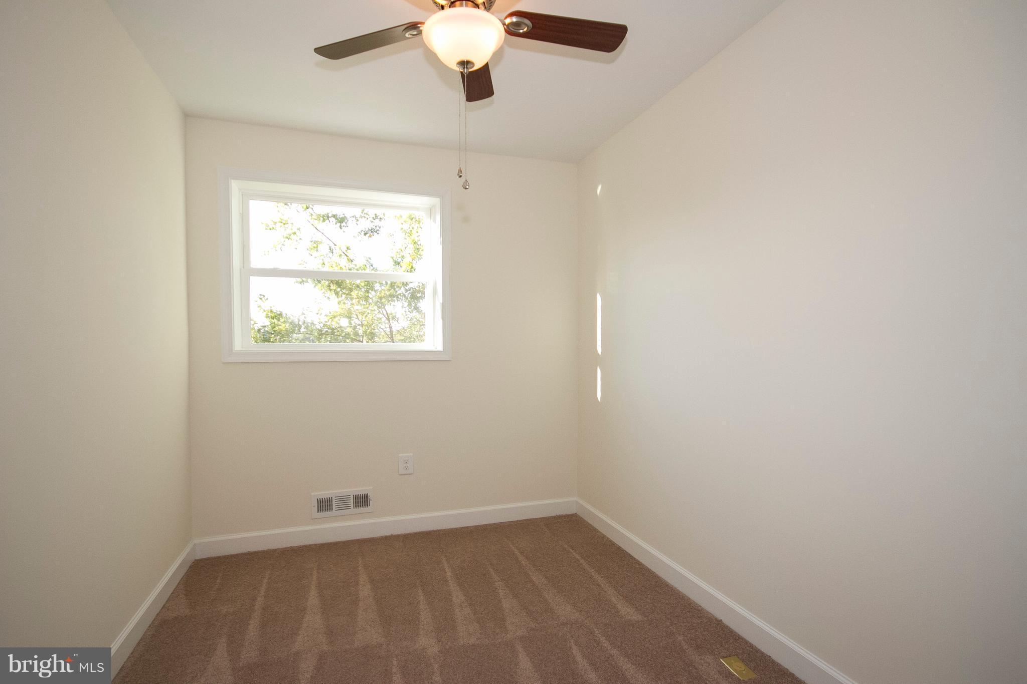 1381 Deanwood Road Baltimore, MD 21234 - Photo 16 of 27 an empty room with a window