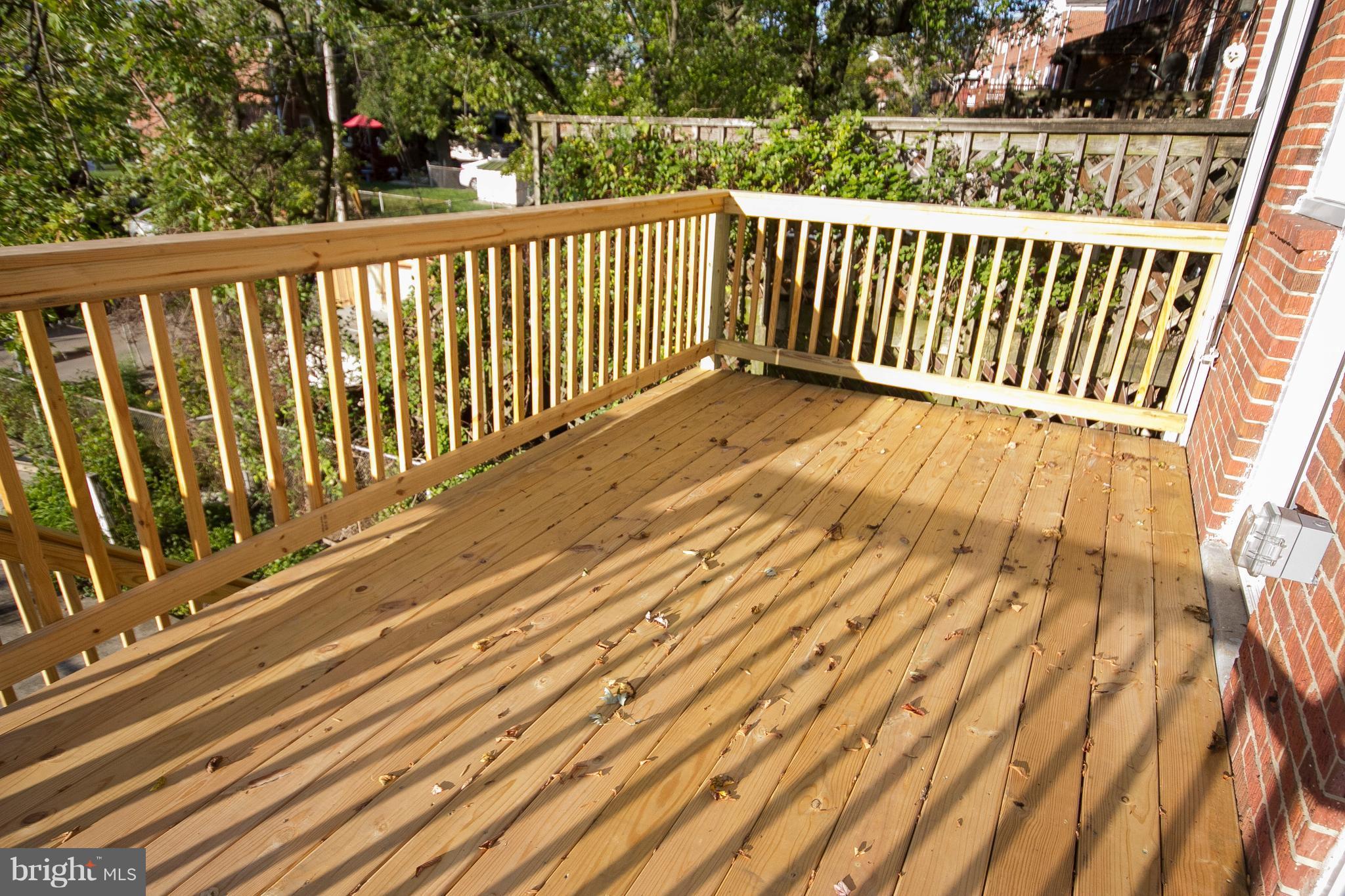 1381 Deanwood Road Baltimore, MD 21234 - Photo 25 of 27 a view of balcony with wooden floor