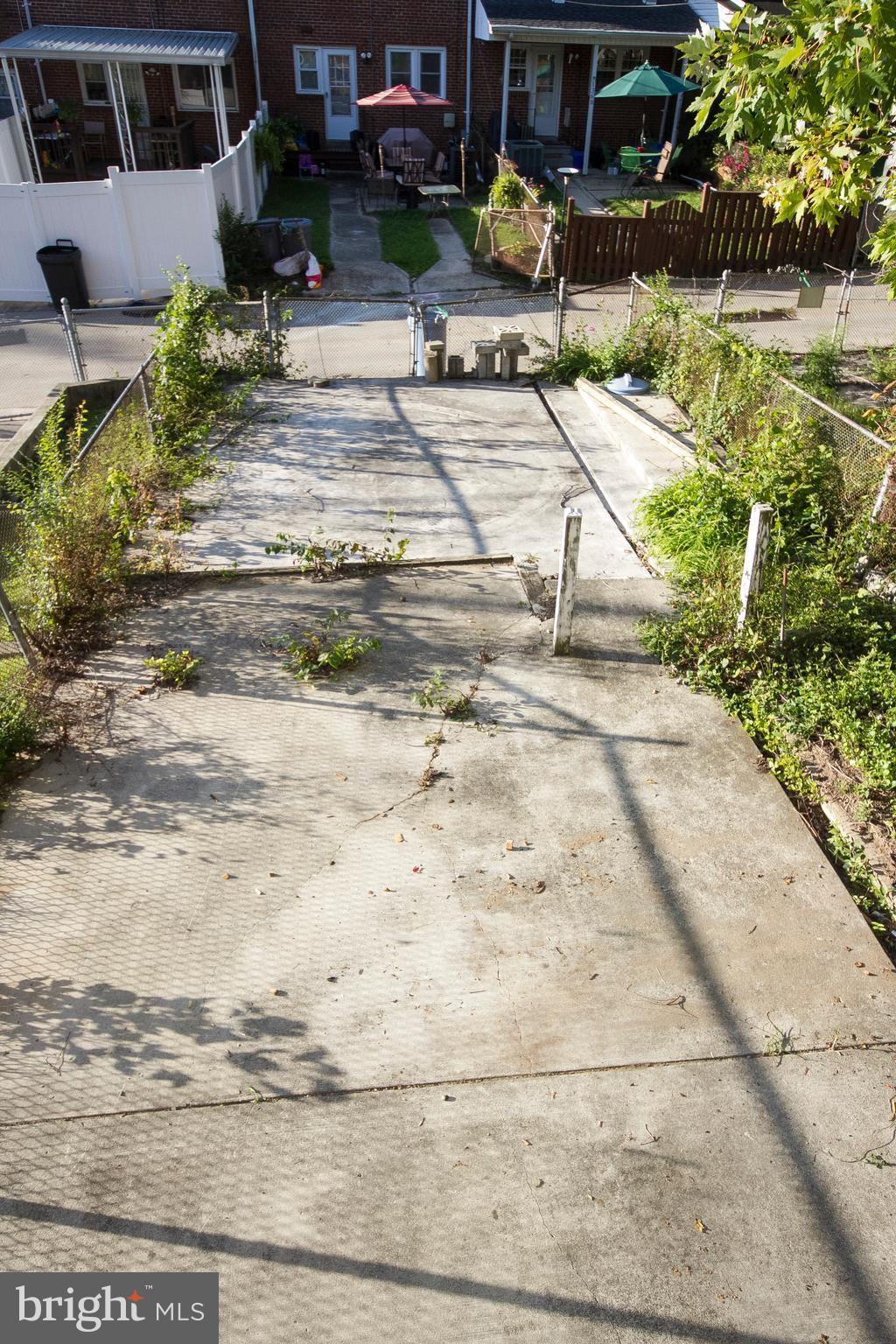 1381 Deanwood Road Baltimore, MD 21234 - Photo 27 of 27 a view of swimming pool with lawn chairs and plants