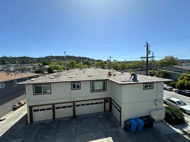 a view of a terrace with a city view
