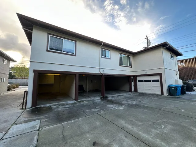 a view of a house with a garage