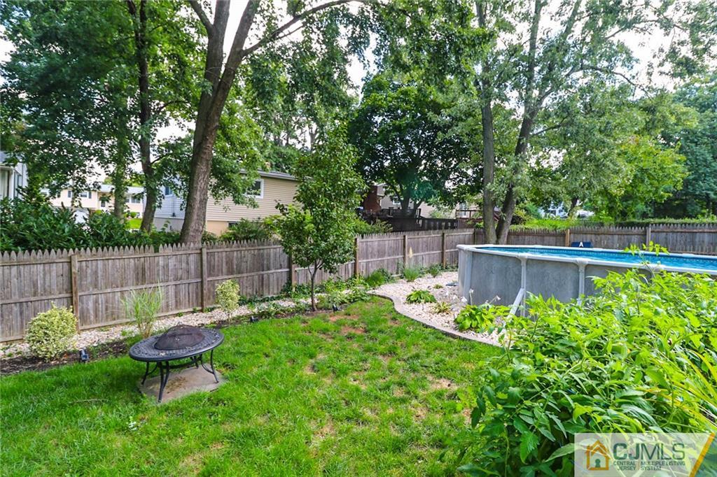 66 Harmon Road Edison, NJ 08837 - Photo 24 of 25 a garden view with a seating space