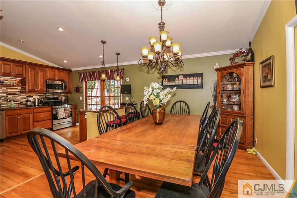 66 Harmon Road Edison, NJ 08837 - Photo 9 of 25 a view of a dining room with furniture