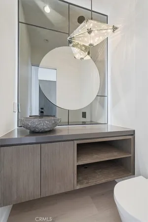 a bathroom with a double vanity sink mirror and double
