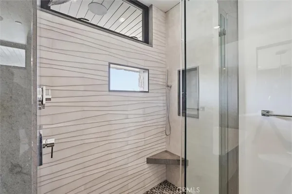 a spacious bathroom with a double vanity sink mirror and double