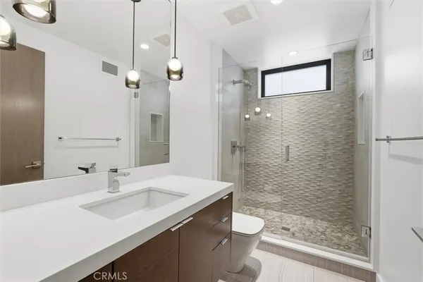 a room with furniture and a flat screen tv