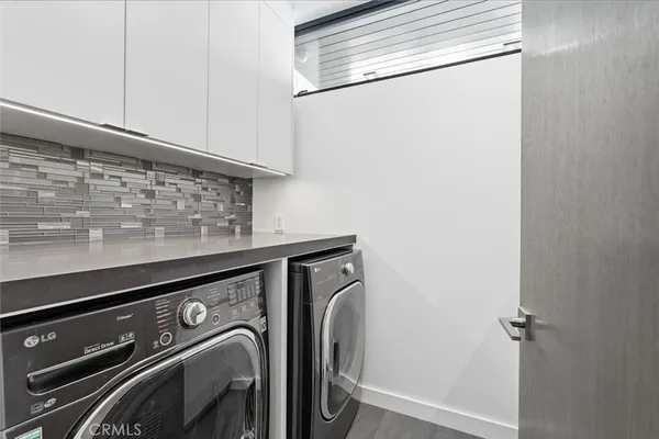 a room with furniture and a flat screen tv