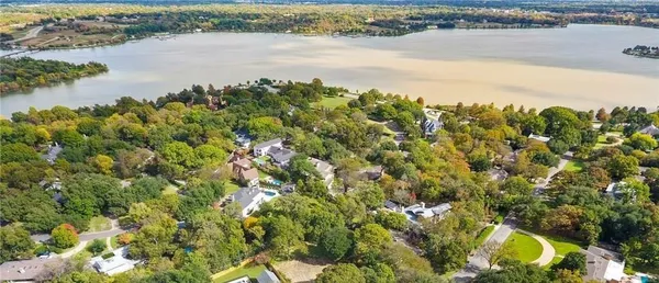 a view of a lake with a houses