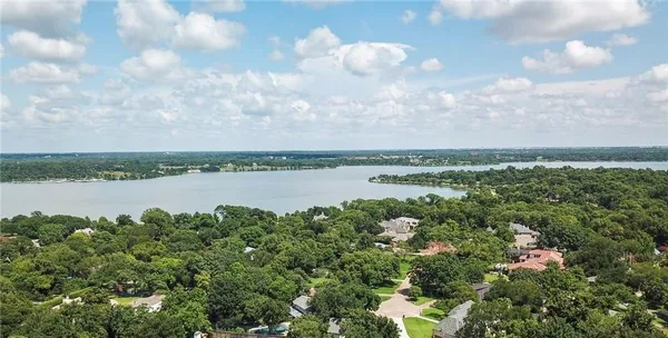 a view of a lake from a yard