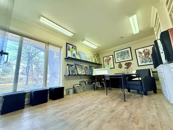 a living room with furniture window and a table