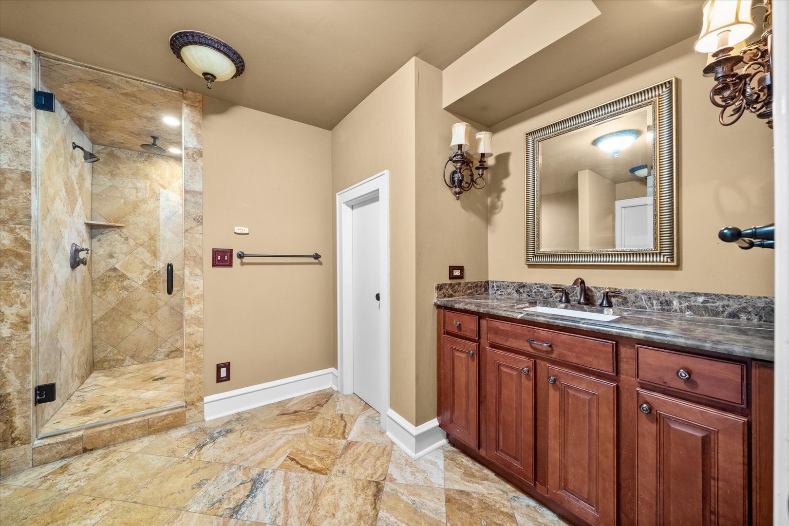 37-w025 Crane Road St. Charles, IL 60174 - Photo 22 of 32 a bathroom with a sink mirror and a shower