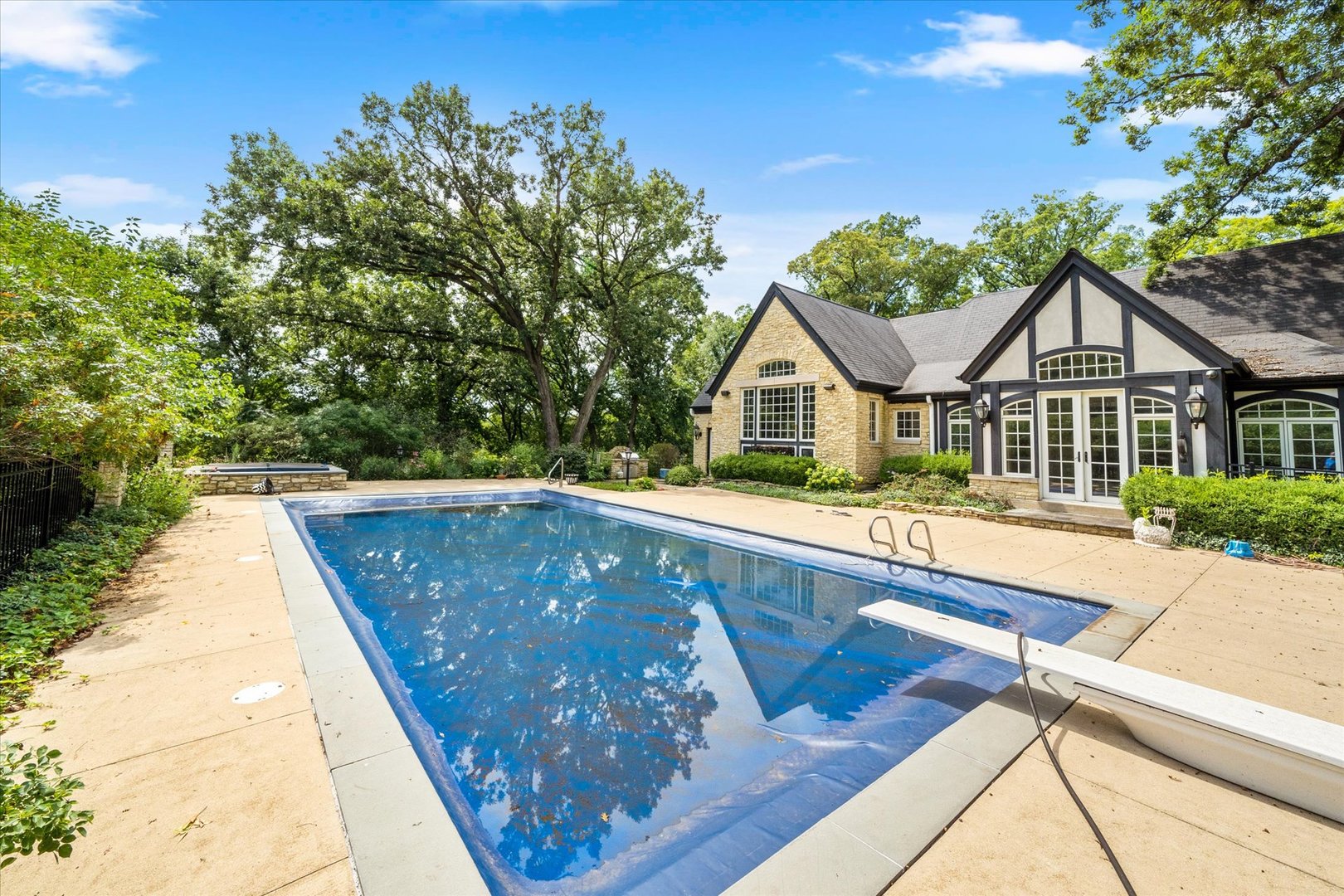 37-w025 Crane Road St. Charles, IL 60174 - Photo 23 of 32 a view of house with swimming pool outdoor seating