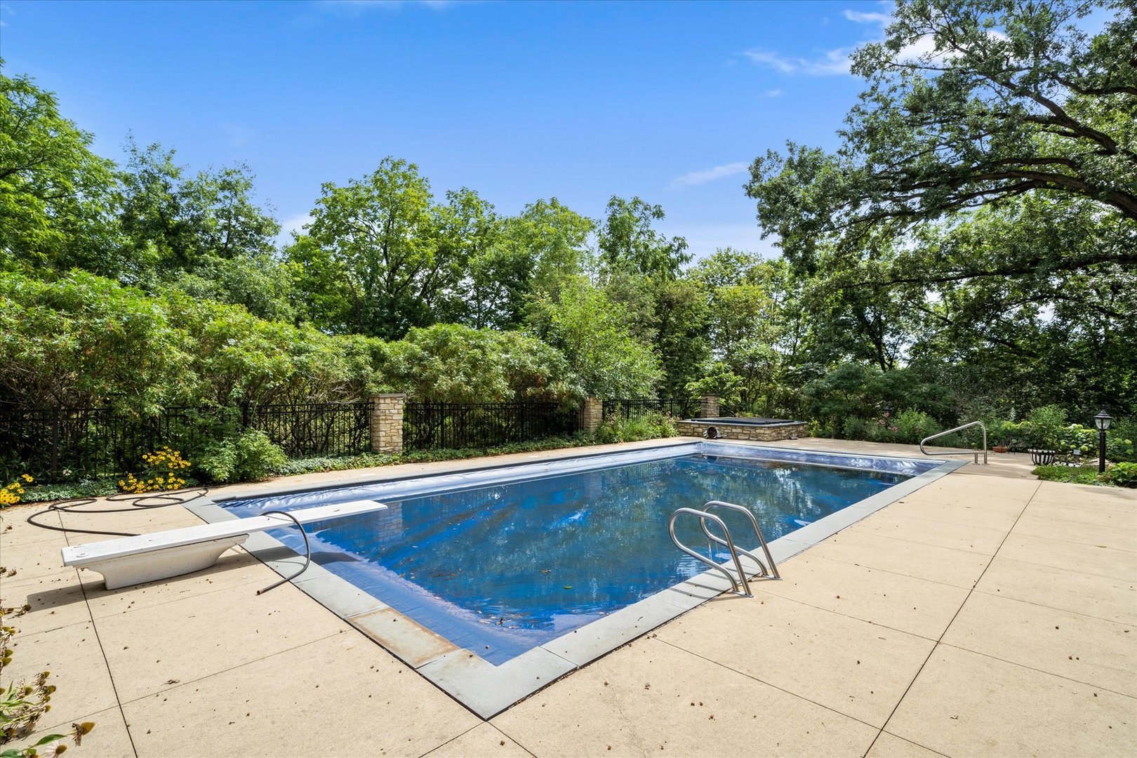 37-w025 Crane Road St. Charles, IL 60174 - Photo 24 of 32 a view of a swimming pool with a yard